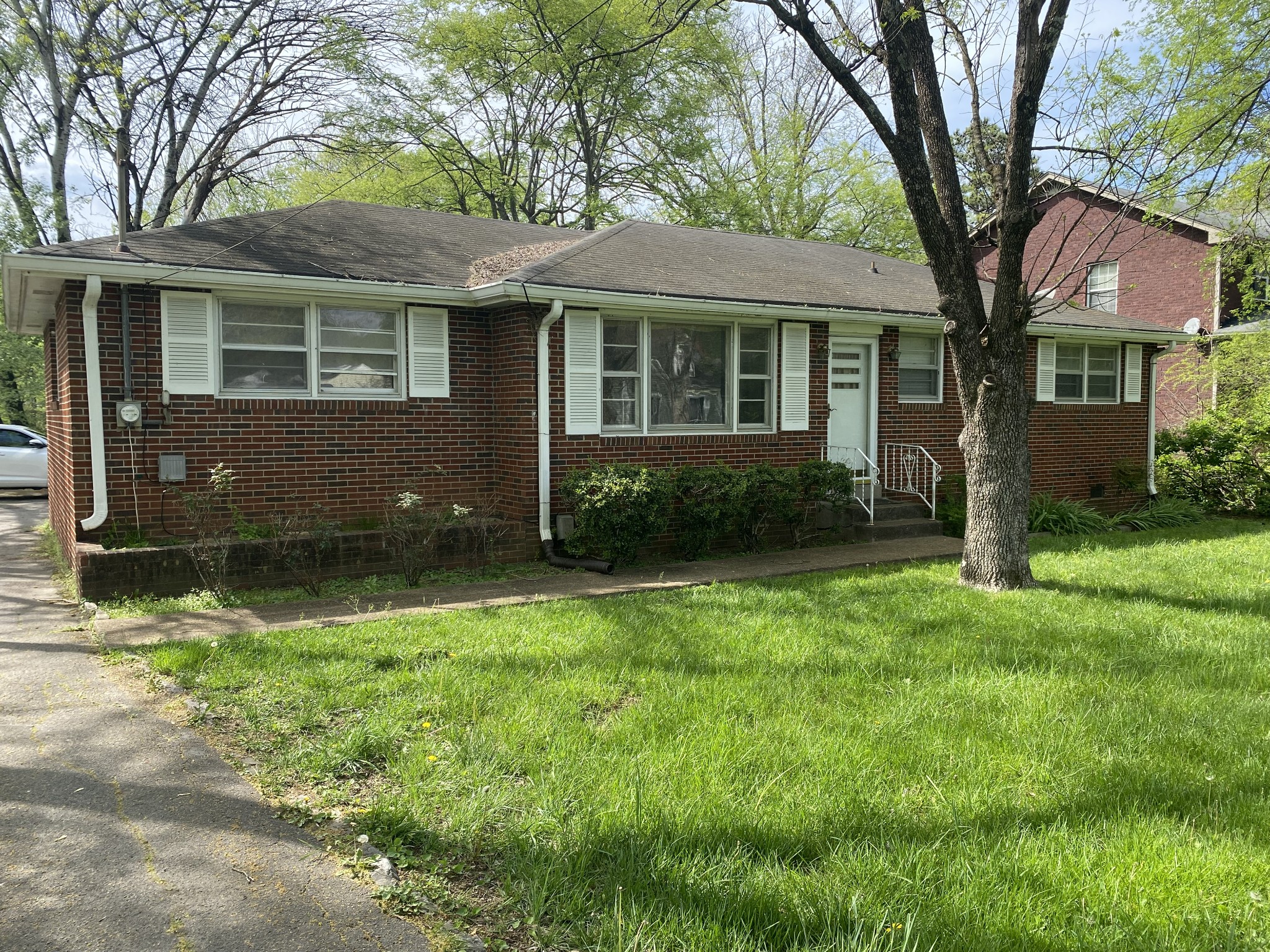 front view of a house and a yard