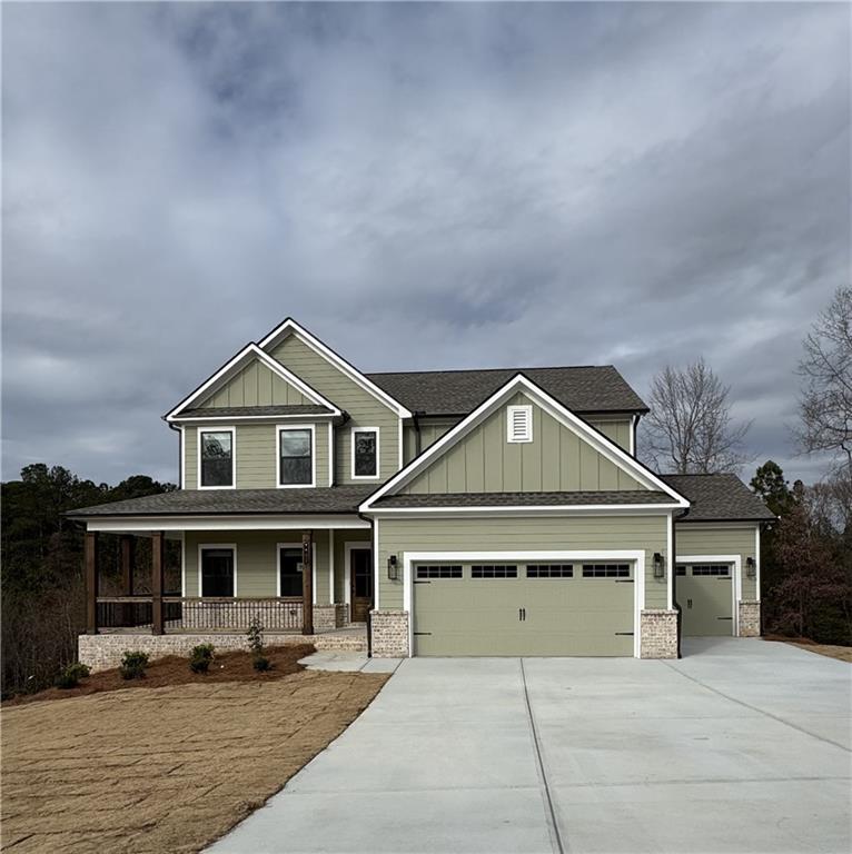 a front view of a house with yard