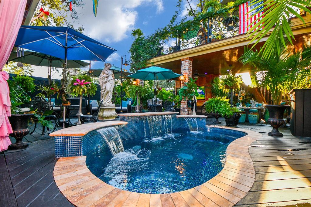 a view of a swimming pool with a patio