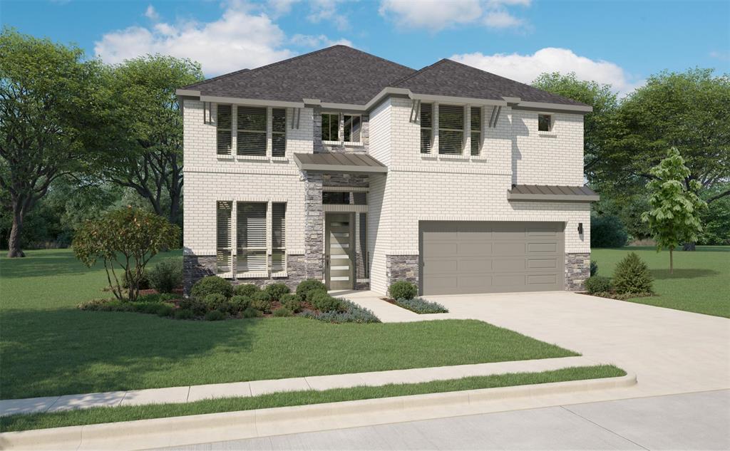 a front view of a house with a garden and garage