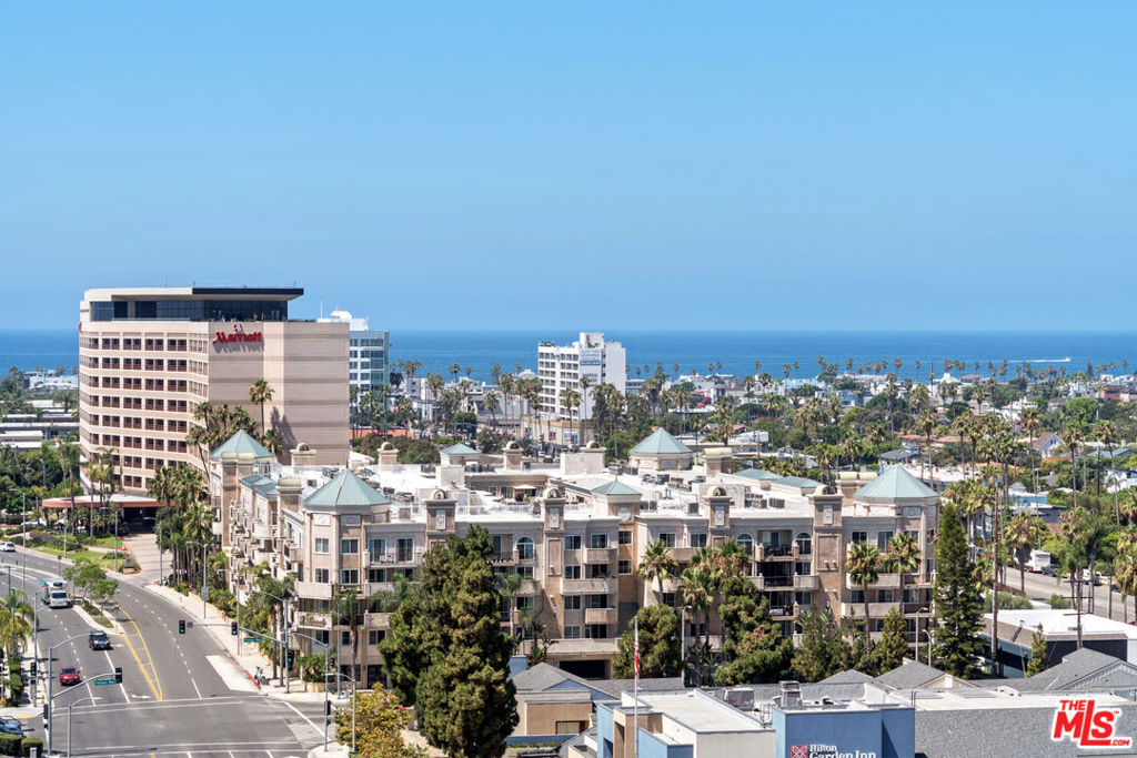 a view of a city with tall buildings