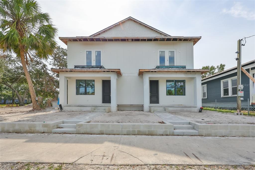 a front view of a house with yard