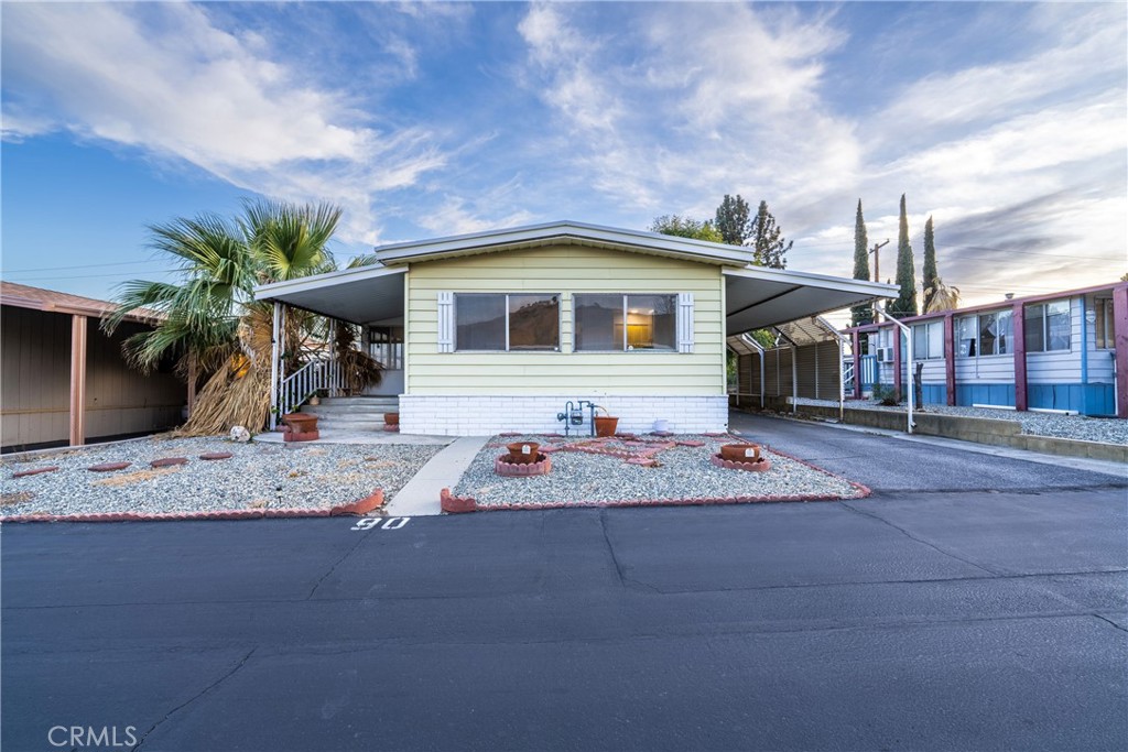 a front view of a house with garage