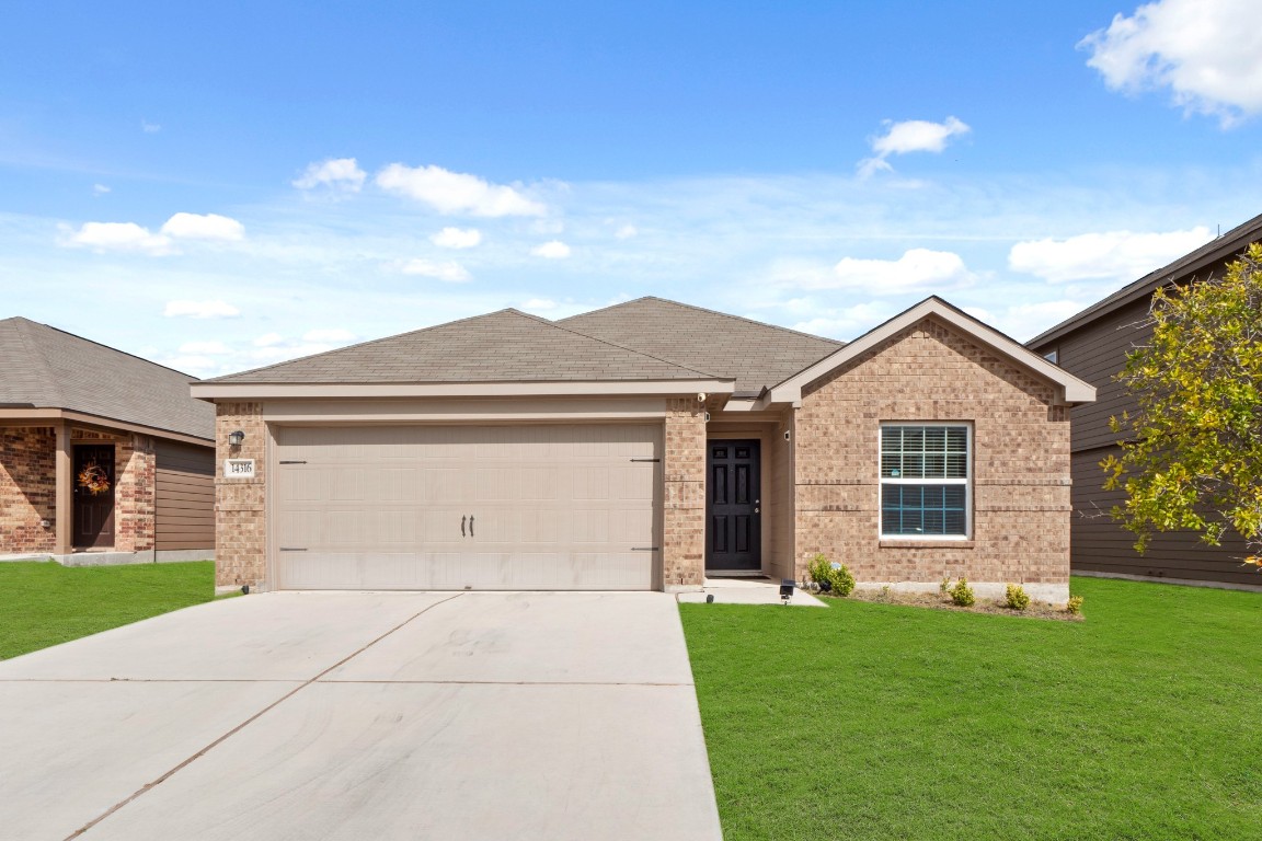 front view of house with a yard