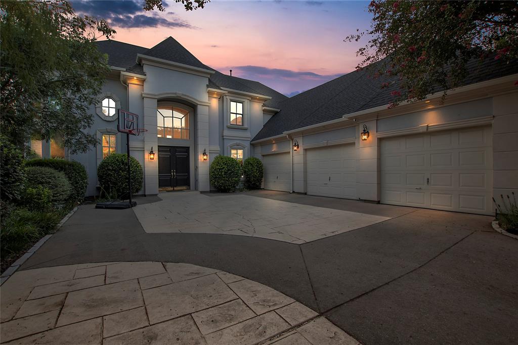 a front view of a house with yard