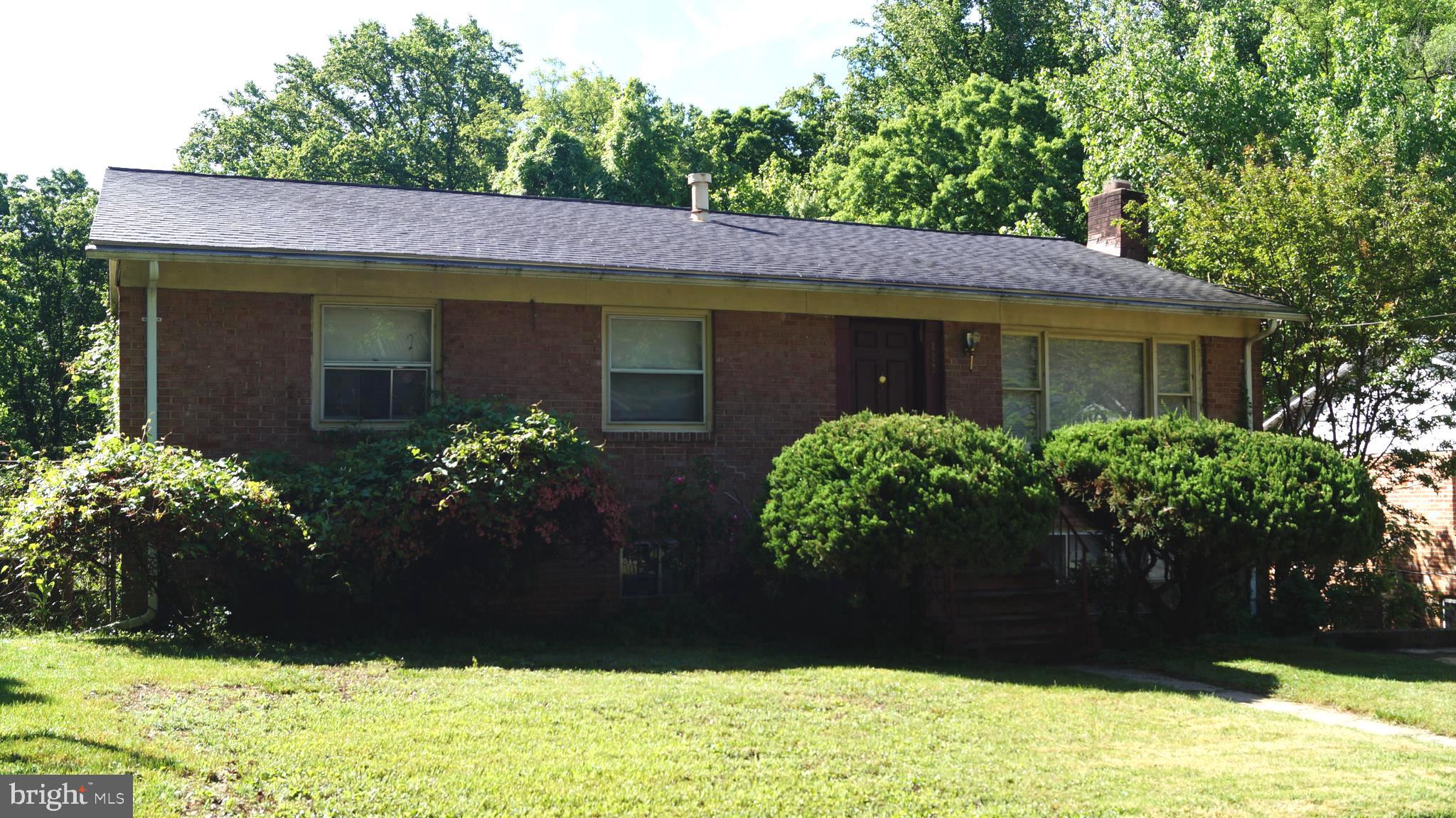 a view of a house with a garden