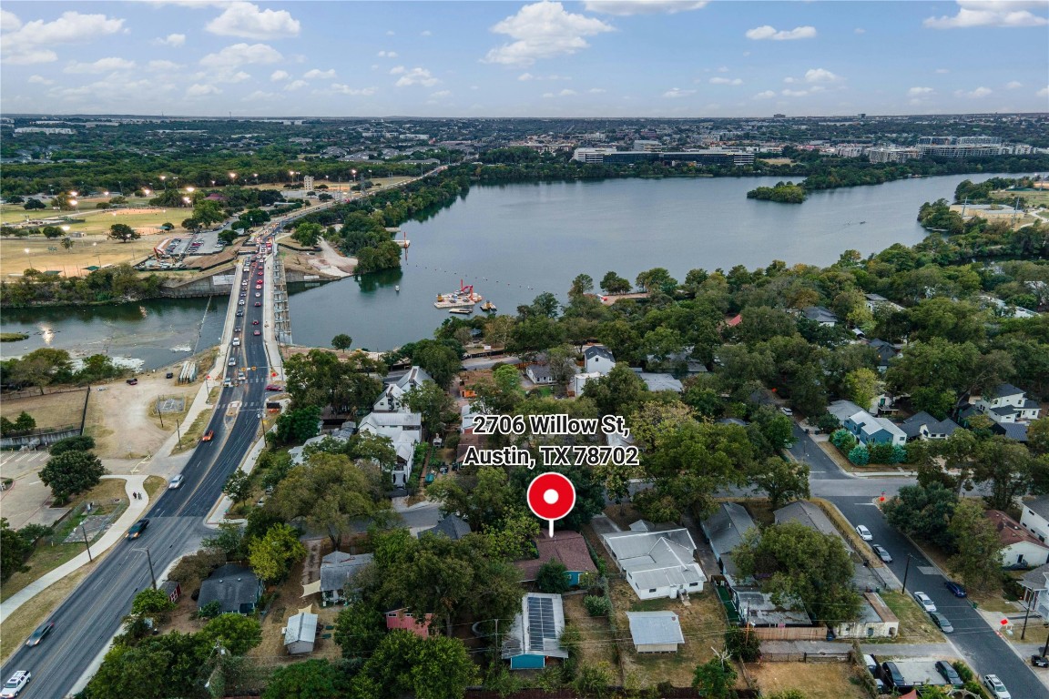 an aerial view of city and lake view