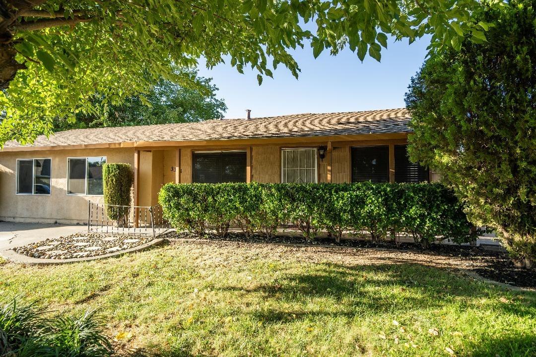 a house view with a garden space