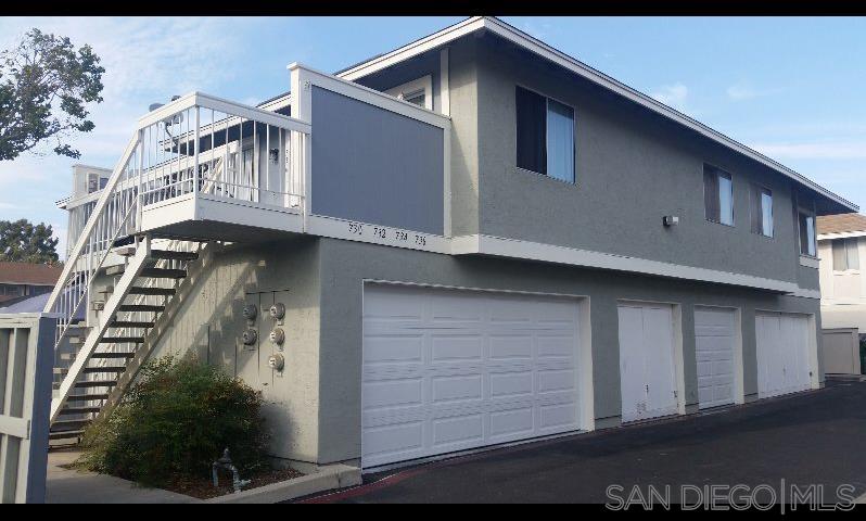 a view of a house with a garage