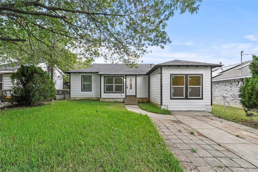 front view of a house and a yard