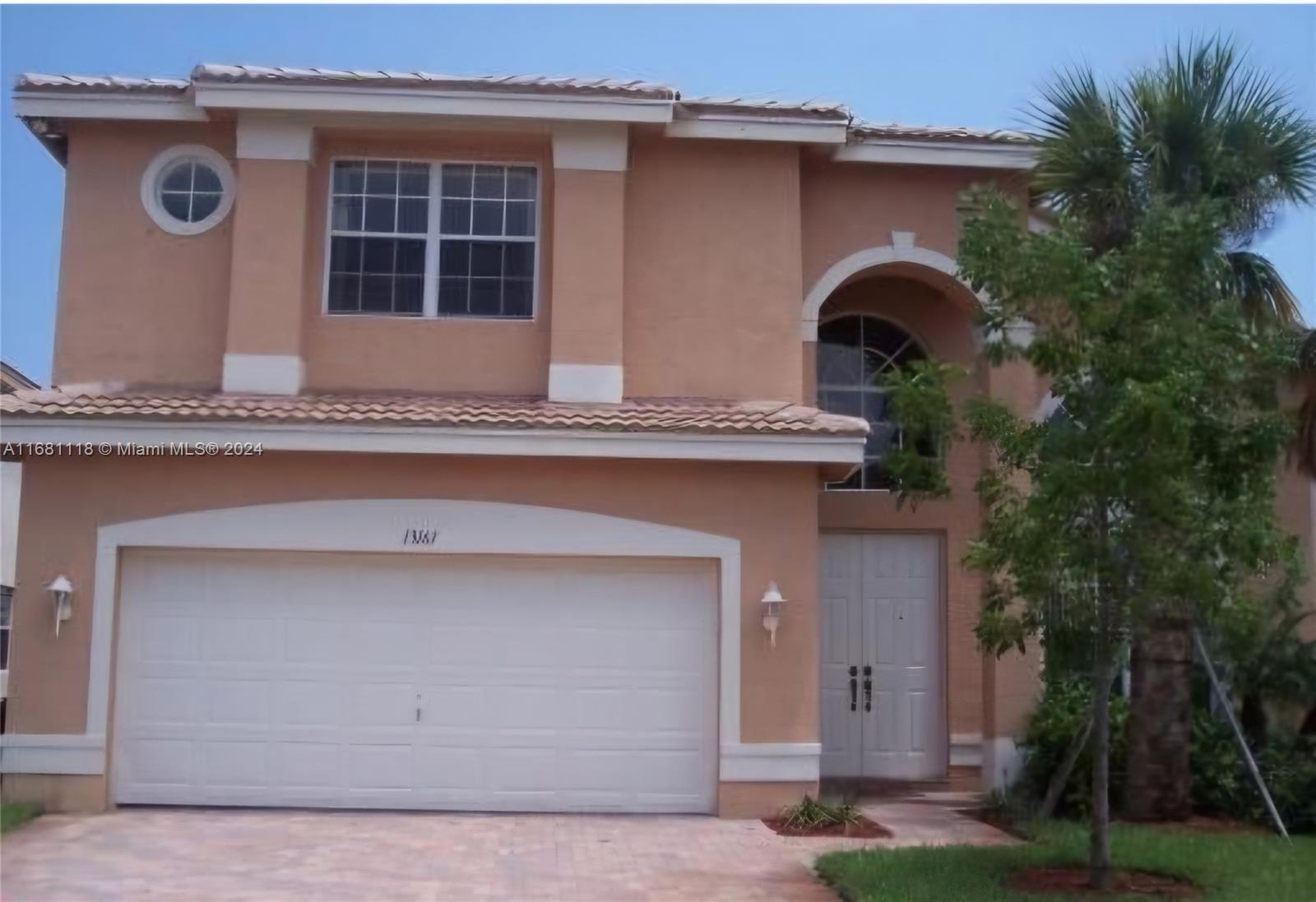 a front view of house with yard