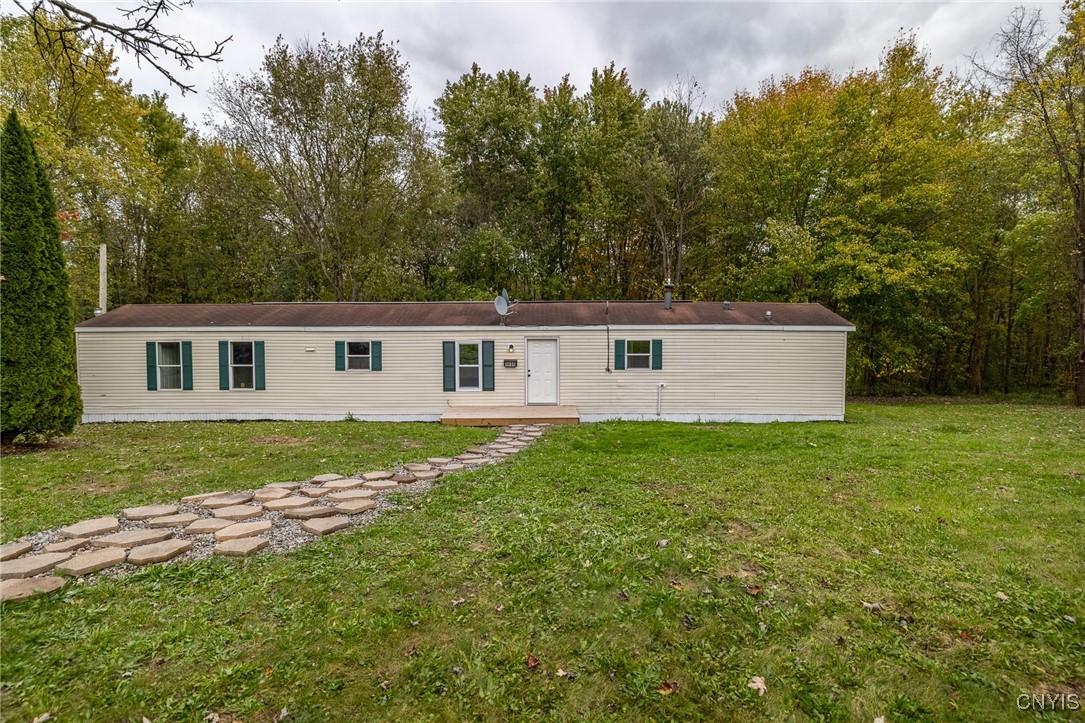 Mobile home sitting on 4.60 acres of beautiful lan