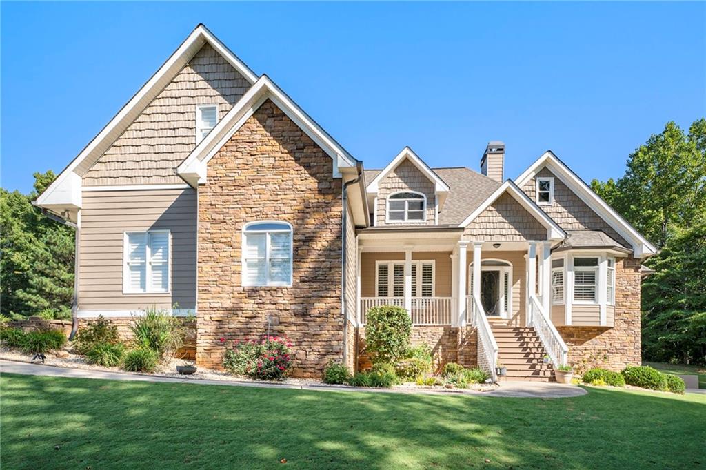 front view of a house with a yard