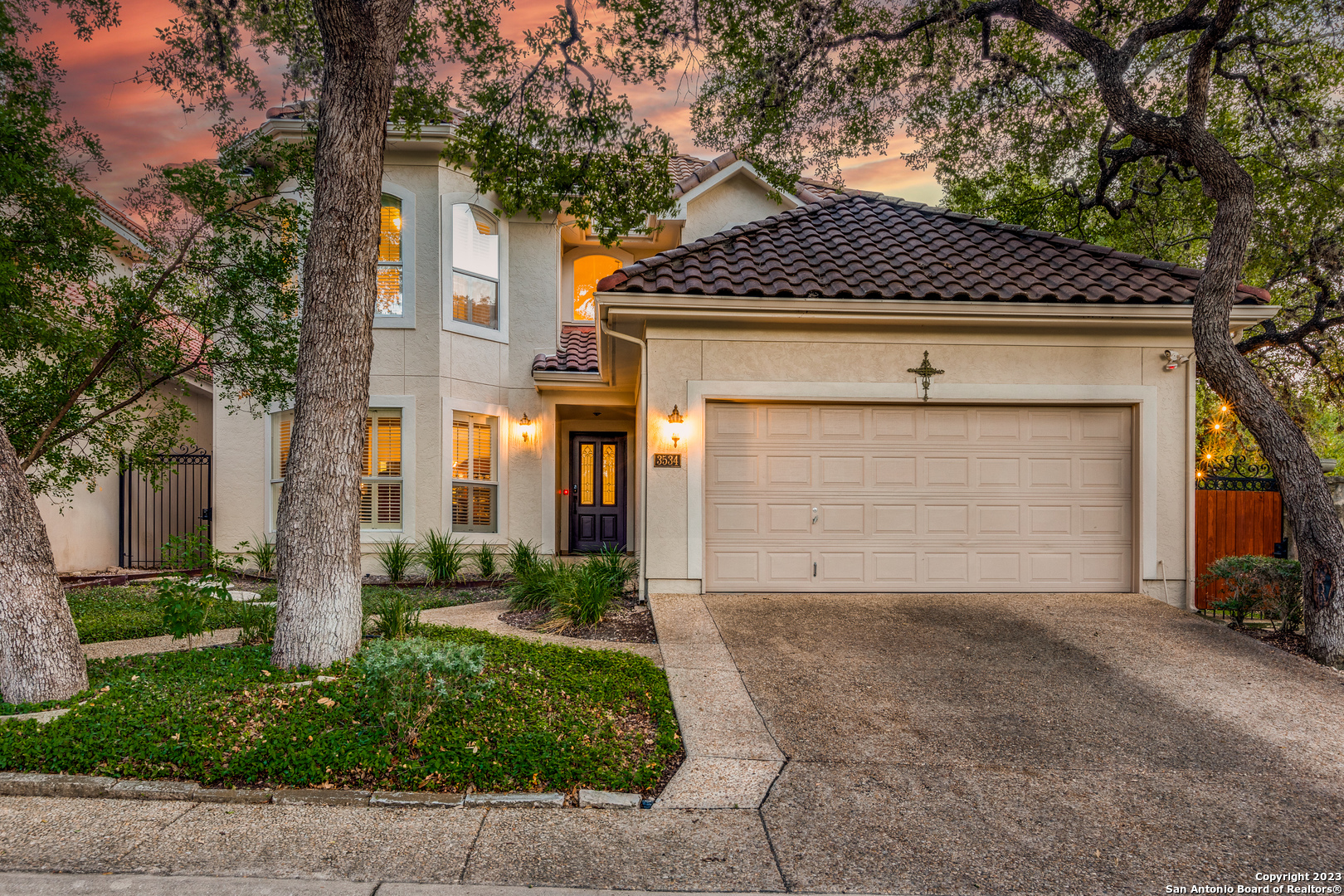 a front view of a house with a garage