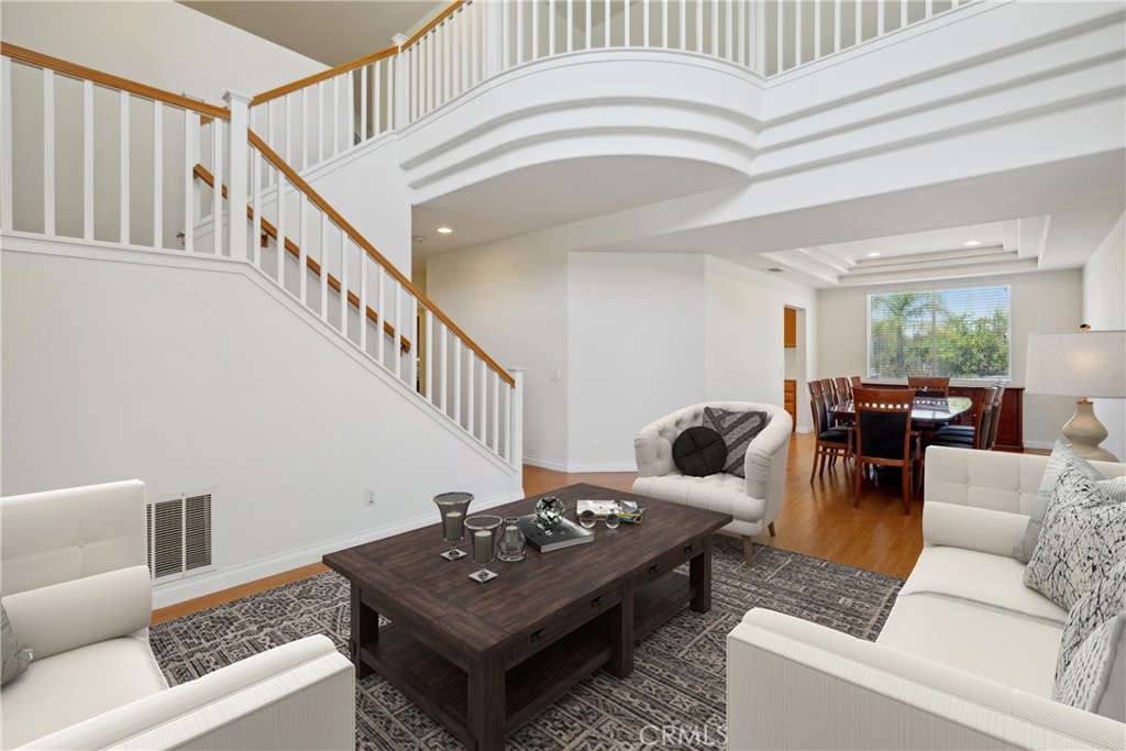 a living room with furniture and a table