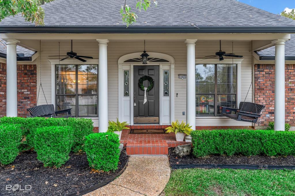 a front view of a house with a porch