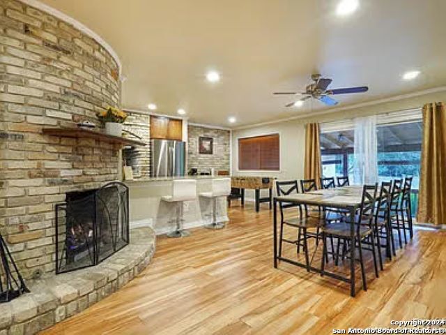 a view of a livingroom with furniture and a fireplace