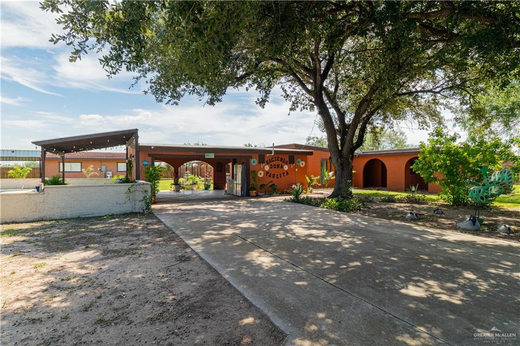 a view of a outdoor space in front of a house