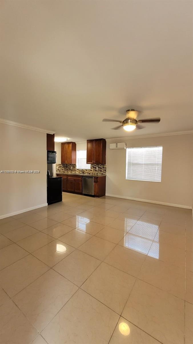 a view of a livingroom with furniture