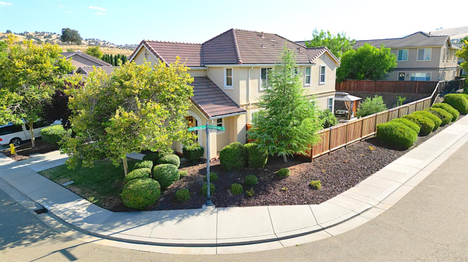 a view of a house with a garden