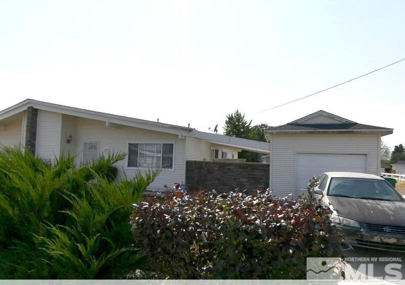 a front view of house with yard