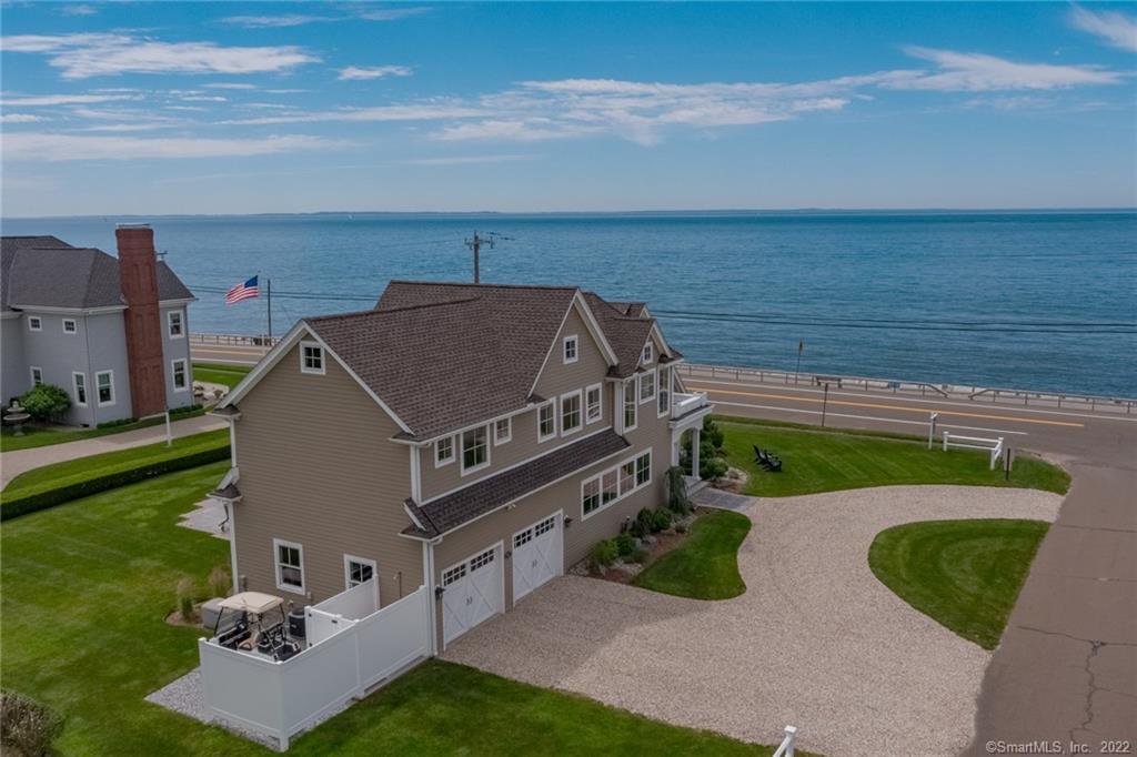 Stunning property with spectacular unobstructed 180 degree views of Long Island Sound - redesigned to capture the essence of being on the water