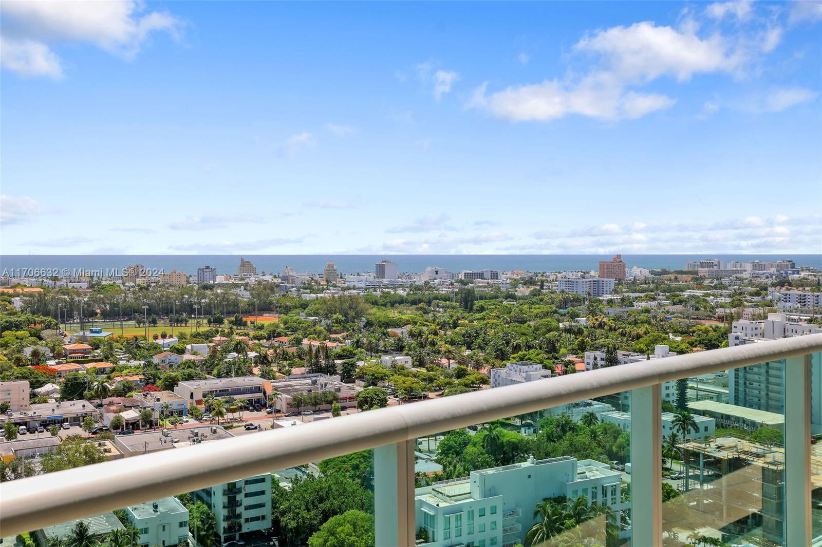 a view of a city from a balcony