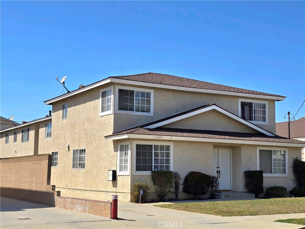 a front view of a house with garage