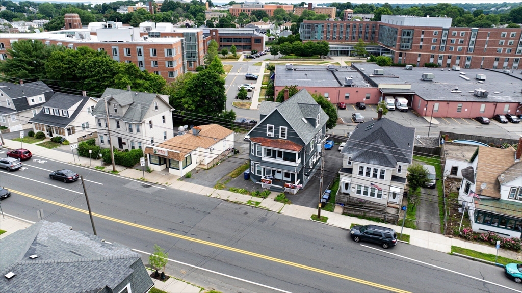 a picture of houses with streets and trees