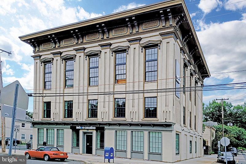 a view of a building with a street