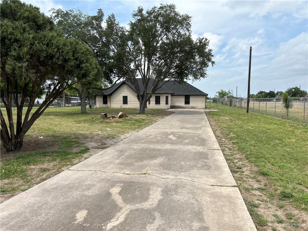 View of front of property featuring a front yard