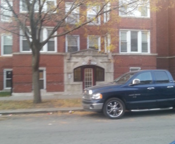 a car parked in front of a house