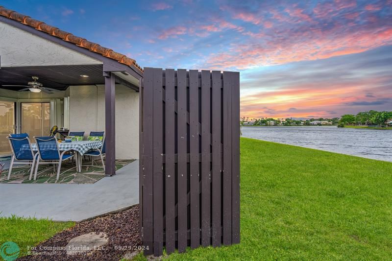 a view of a patio with a backyard