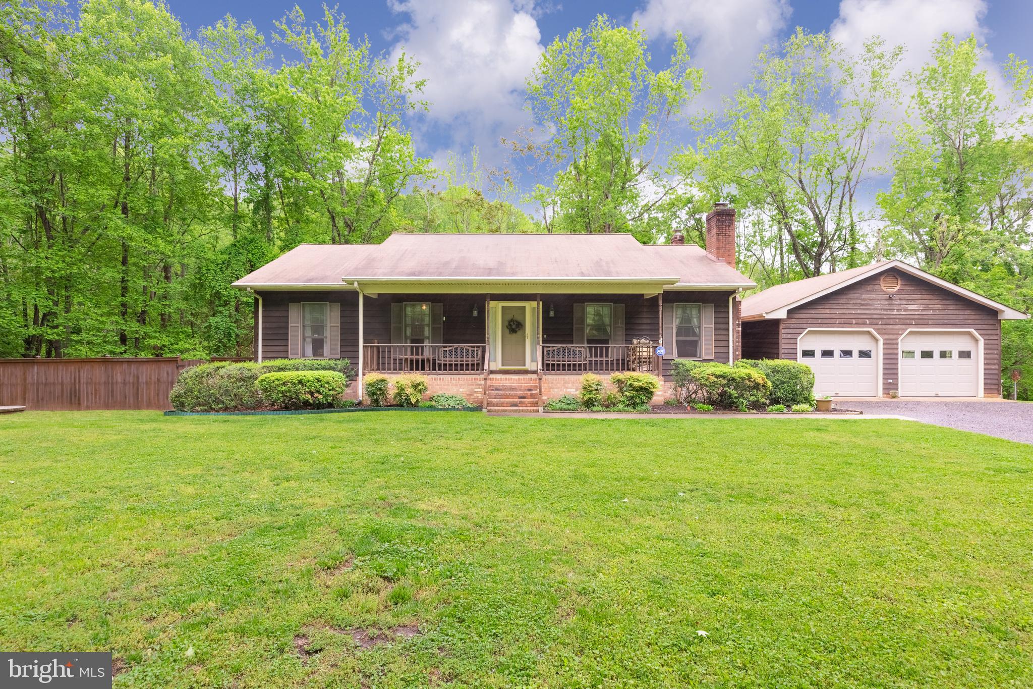 Ranch with detached 2 car garage and breezeway.