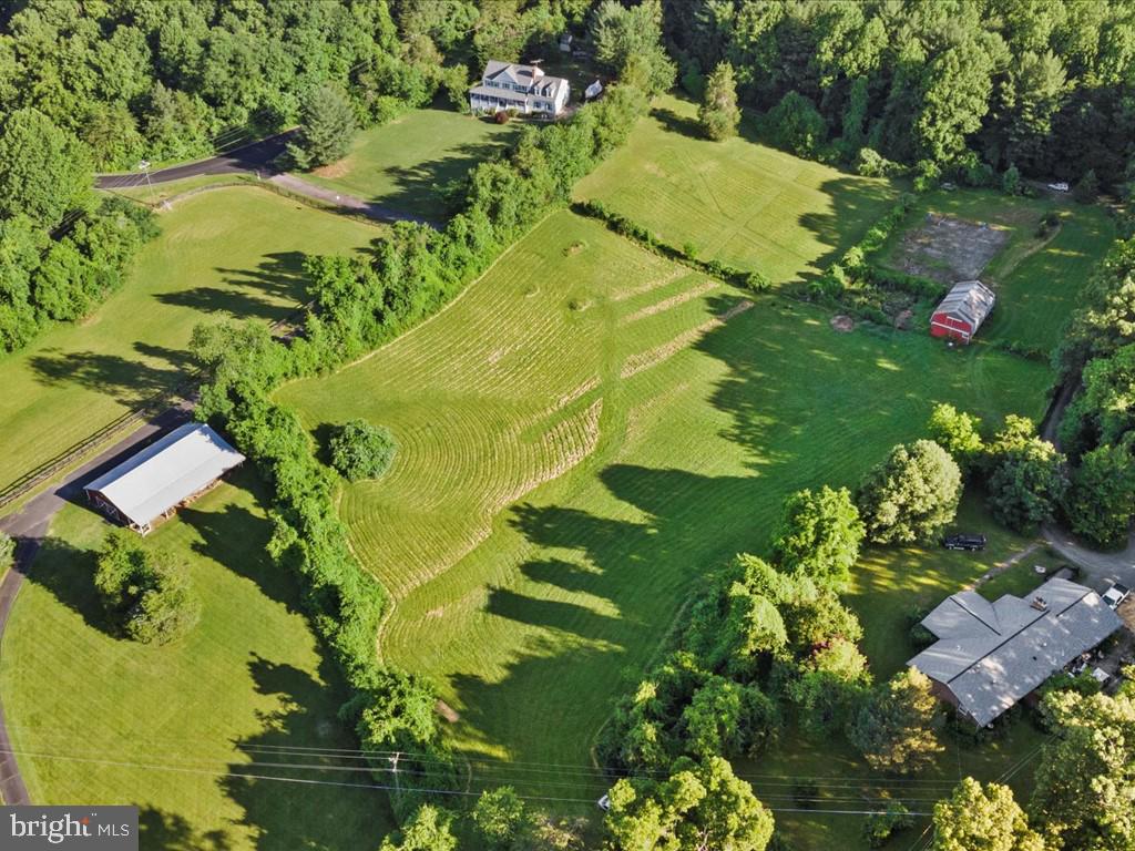 a view of a lake with a yard