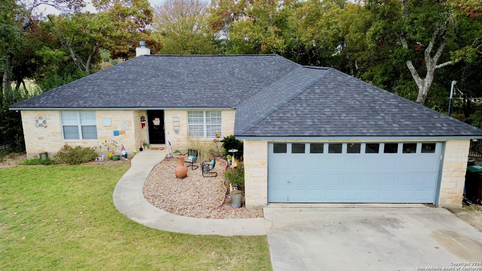 a house view with a garden space