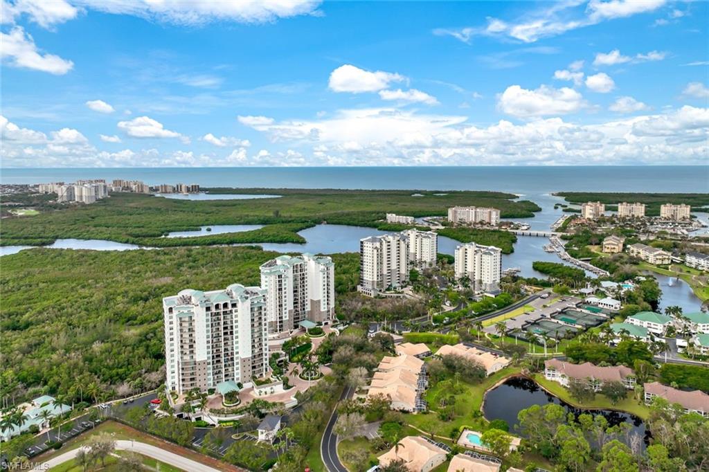 a view of a city with lawn chairs