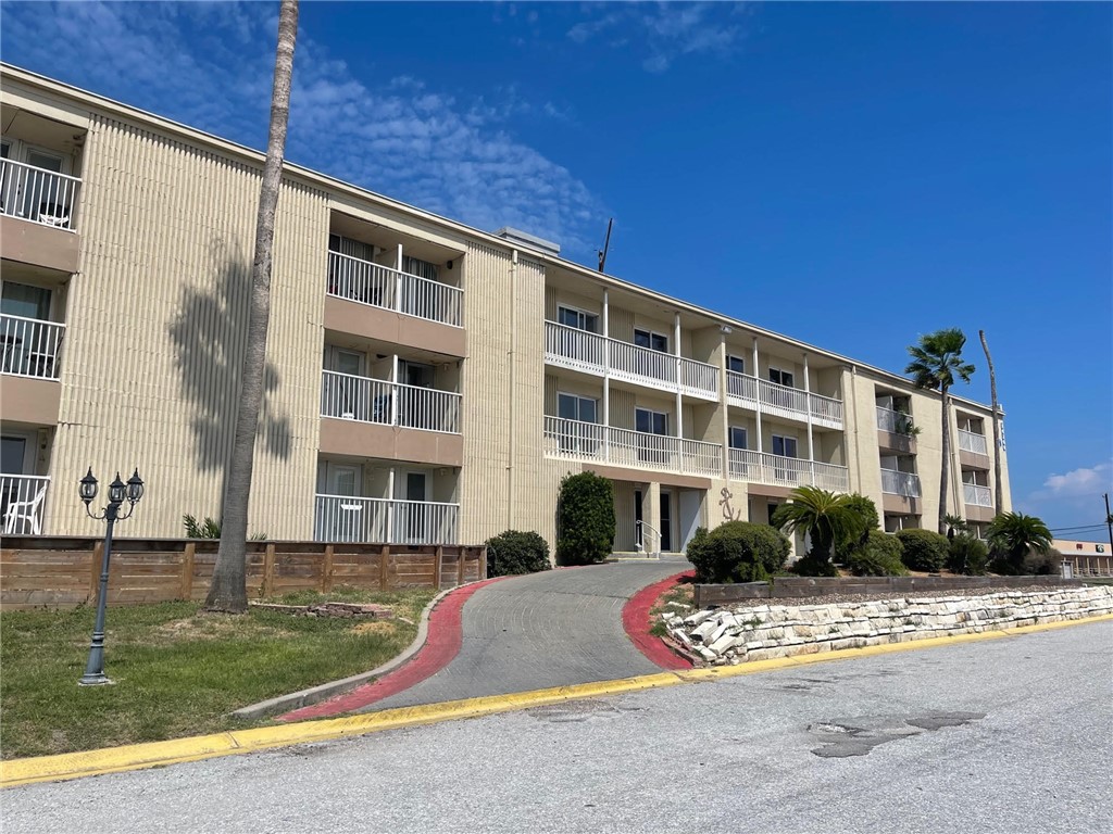 a front view of a building with street view