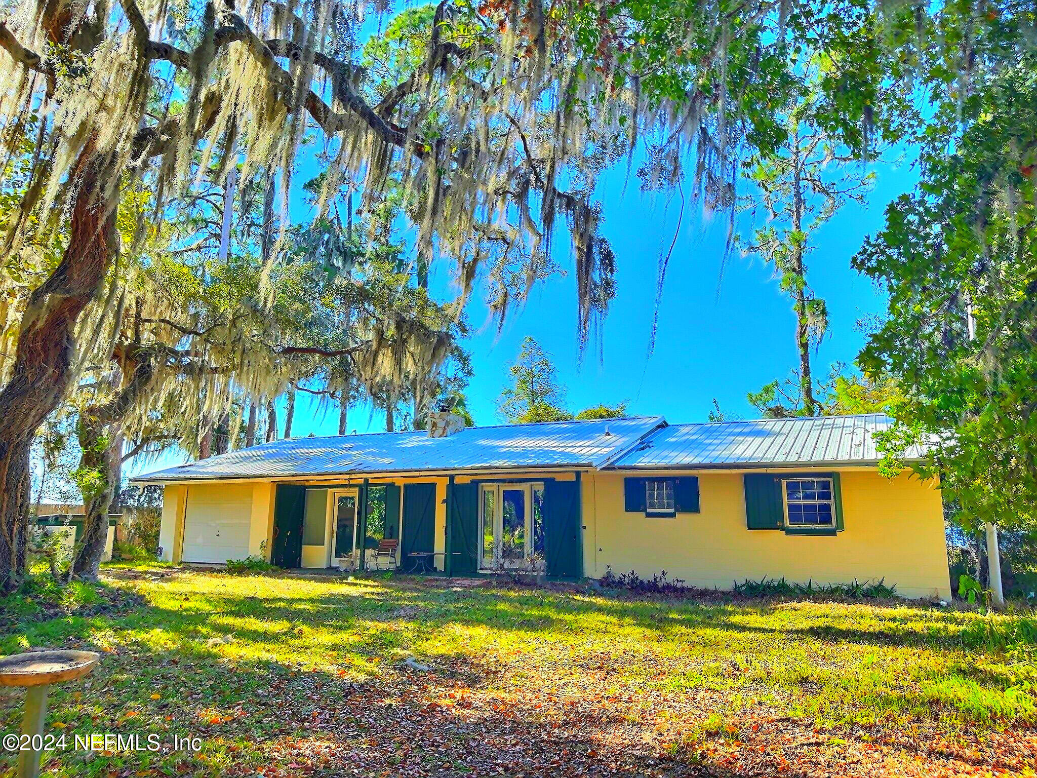 a front view of a house with swimming pool