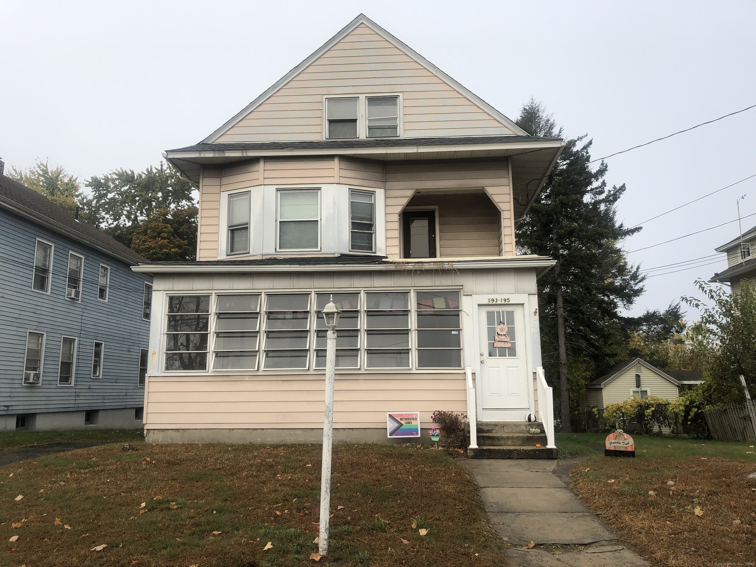 a front view of a house with a garage