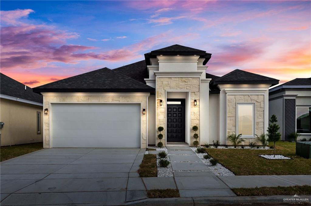 Prairie-style house with a garage