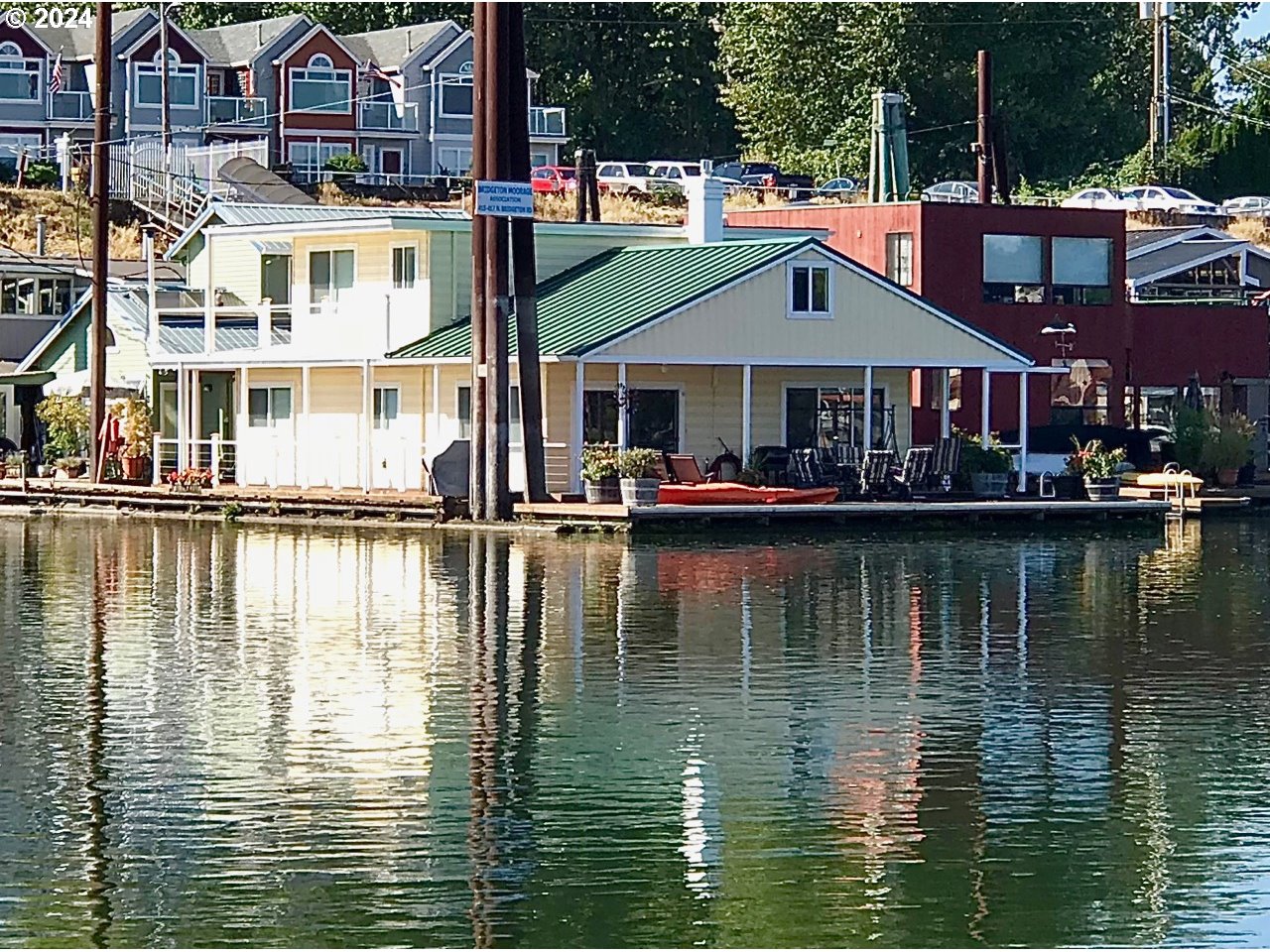 a view of a lake view with a table and chairs