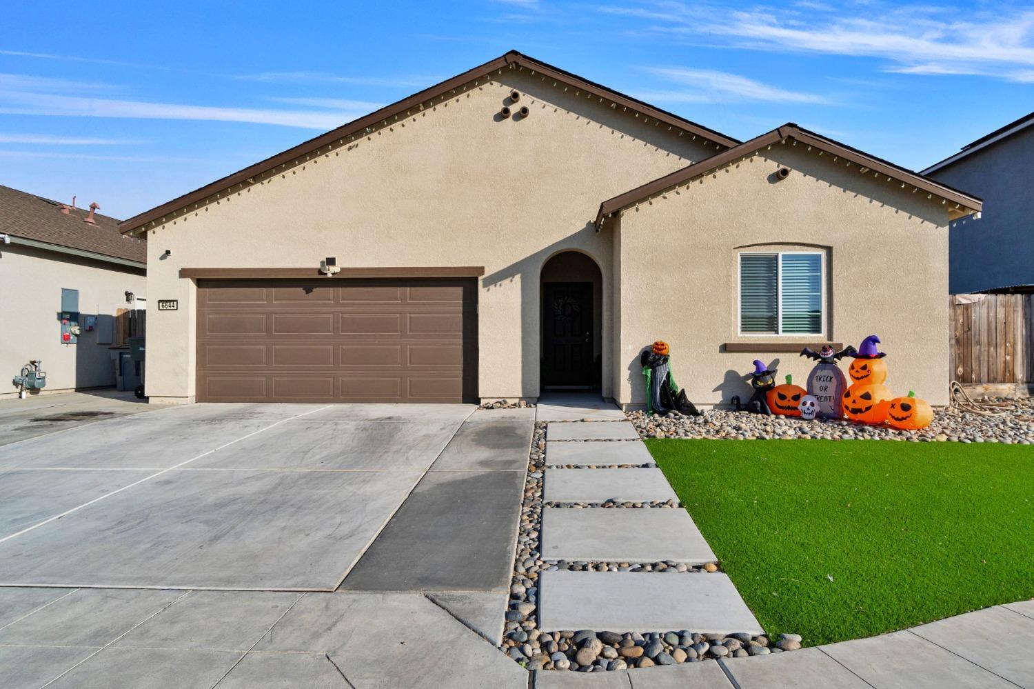 a front view of house with yard