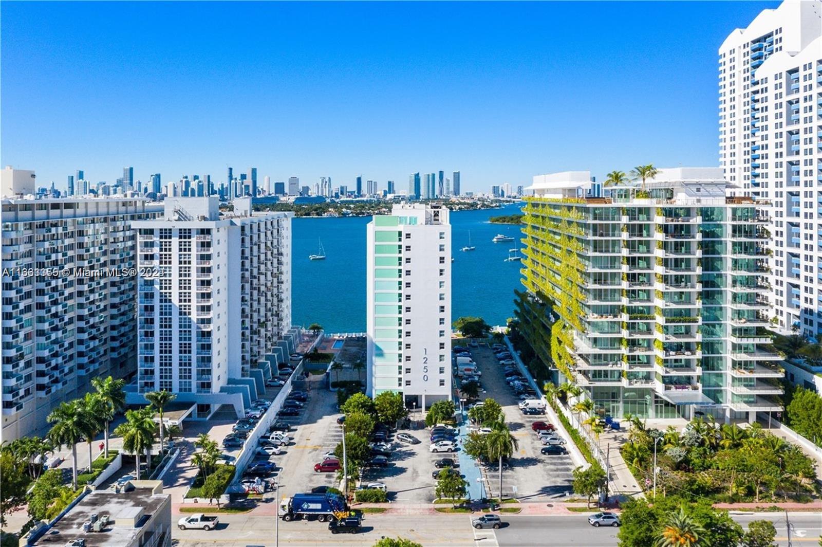 a view of a city with tall buildings