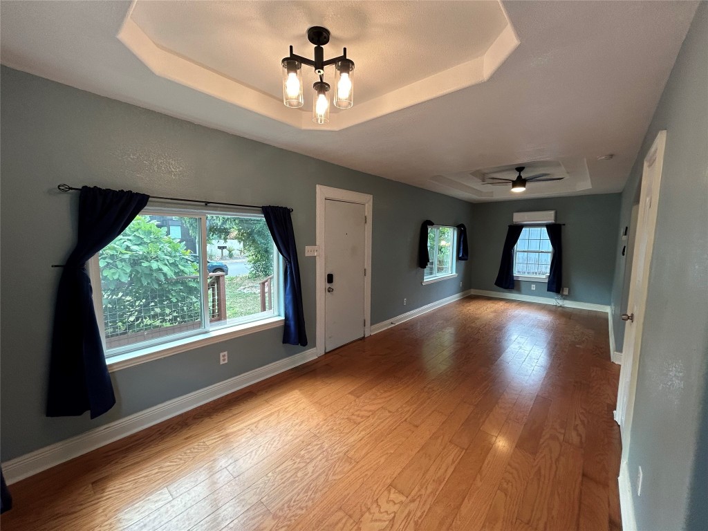 a view of livingroom and hardwood floor