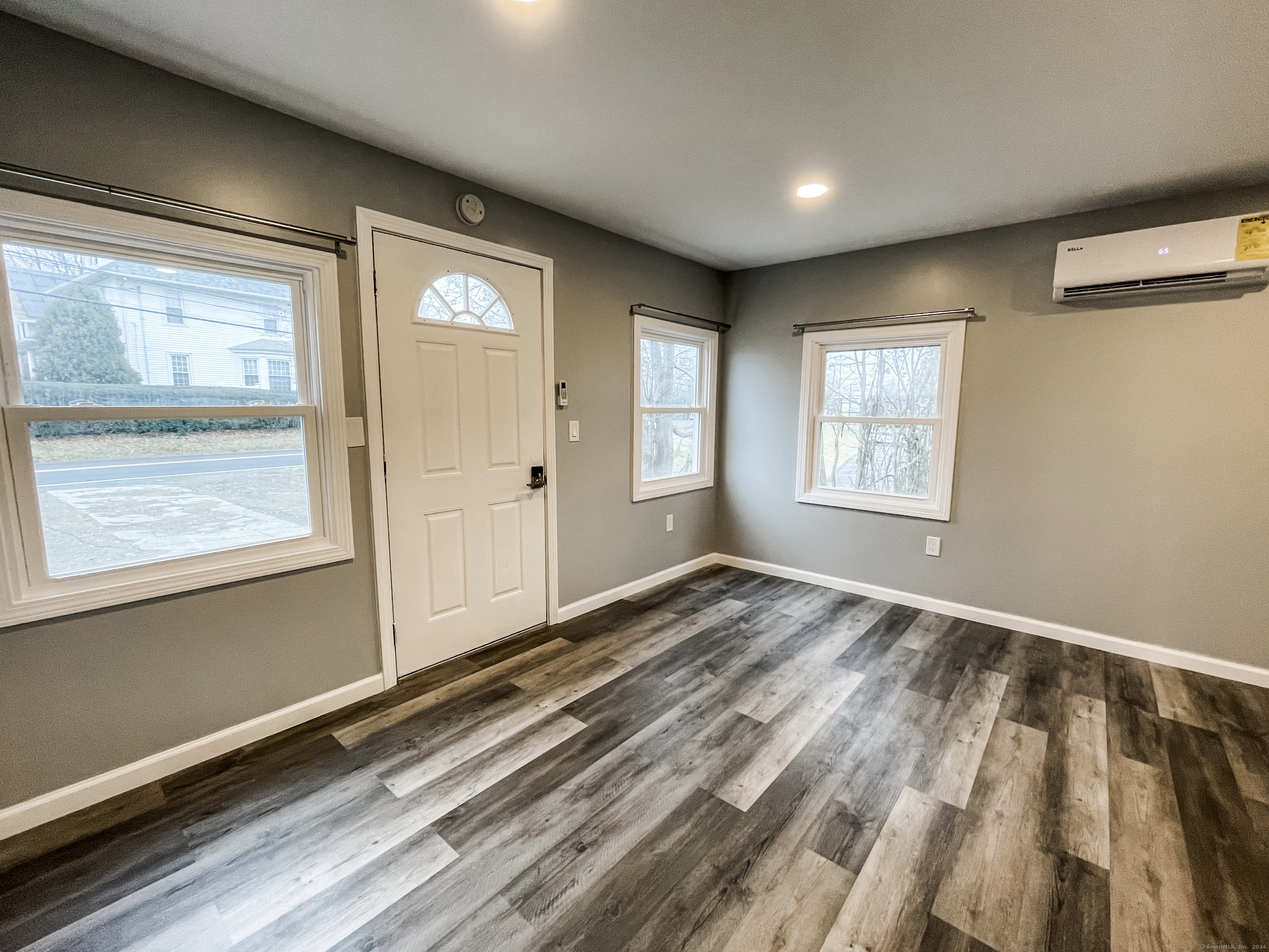 a view of an empty room and window