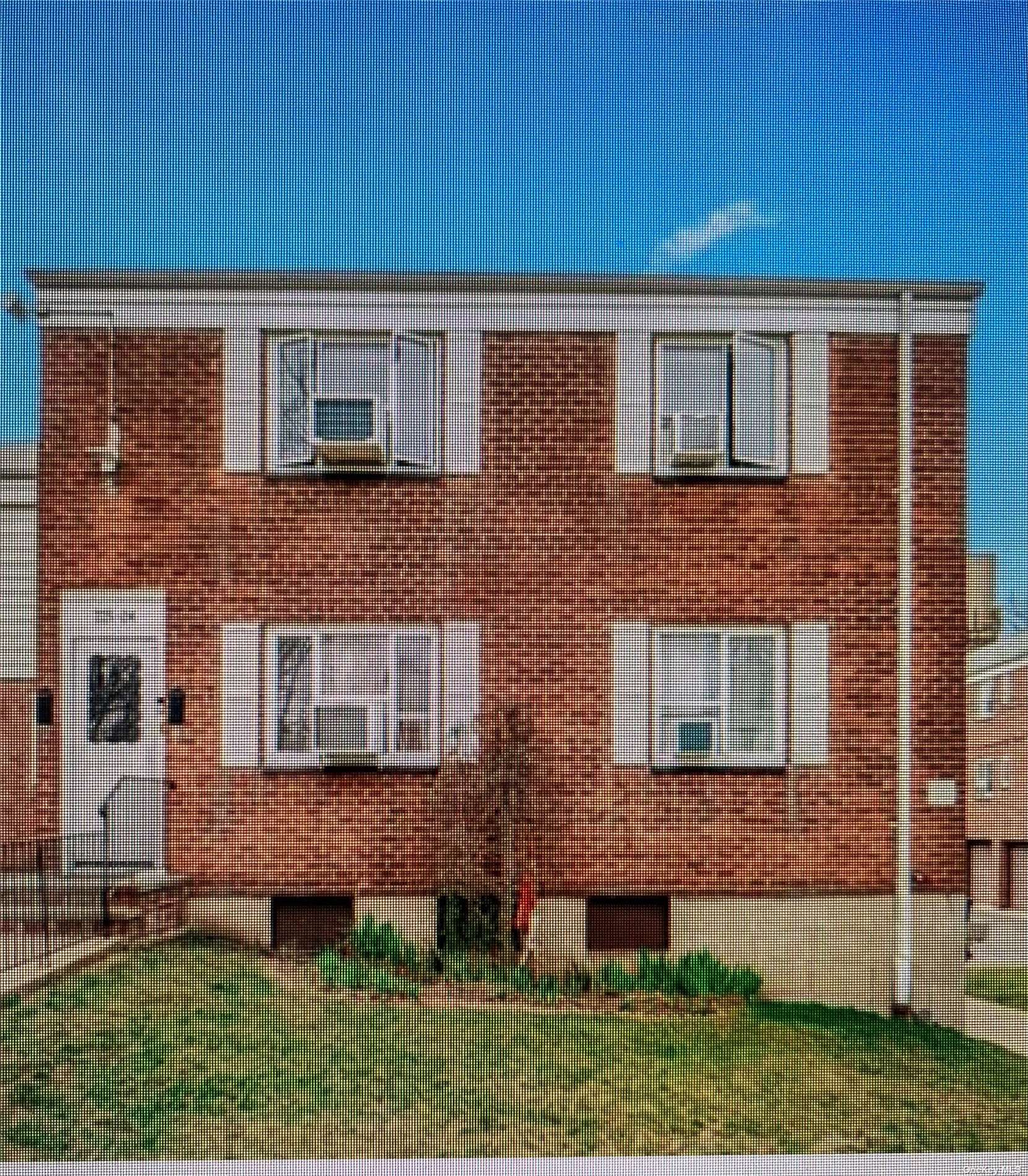 a front view of house with yard