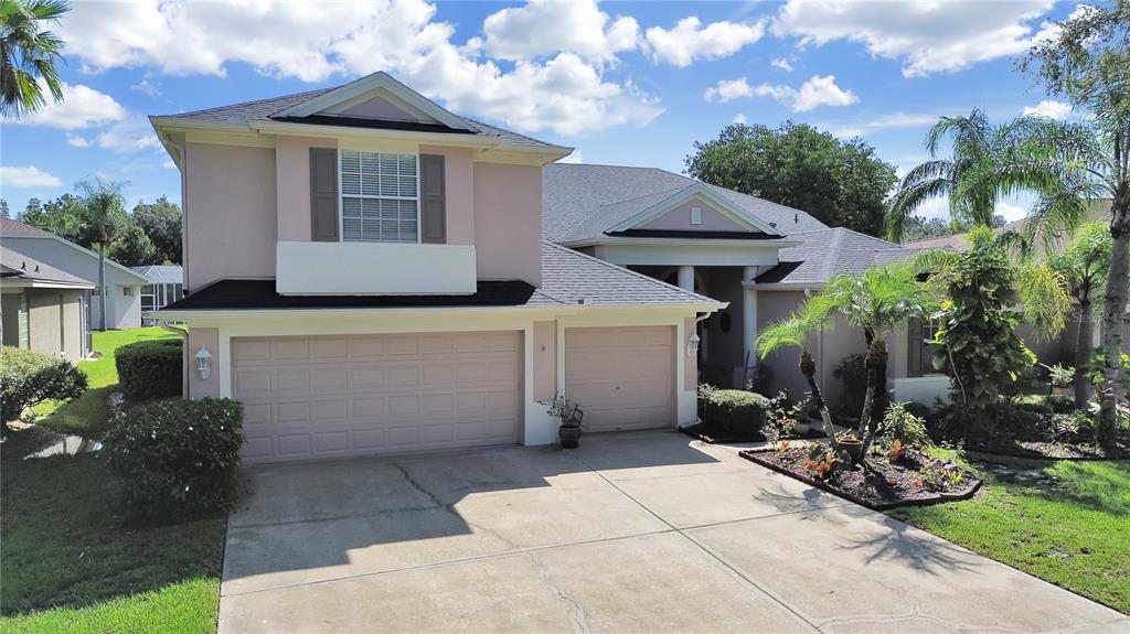 a front view of a house with yard