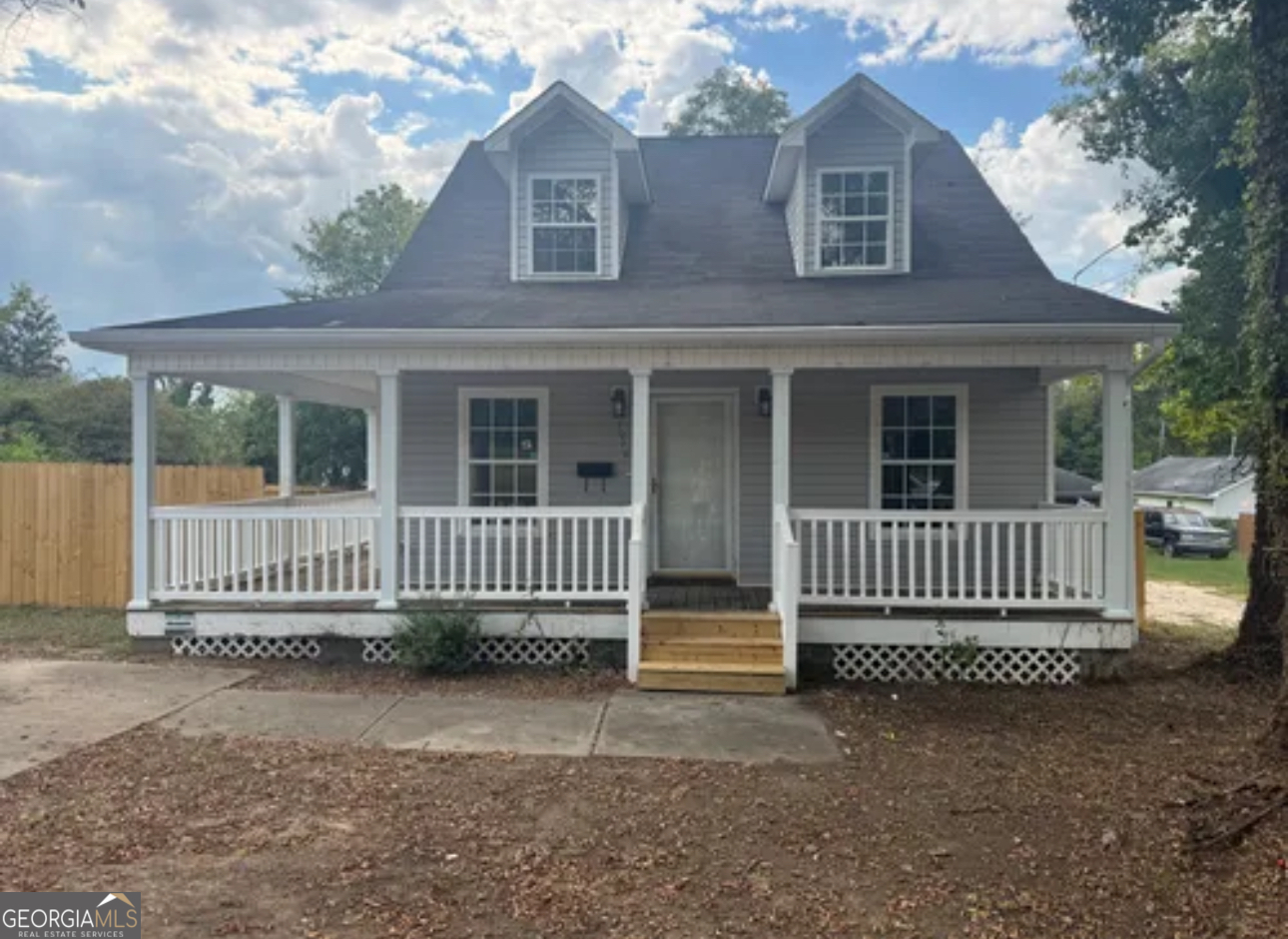 a porch with a bench