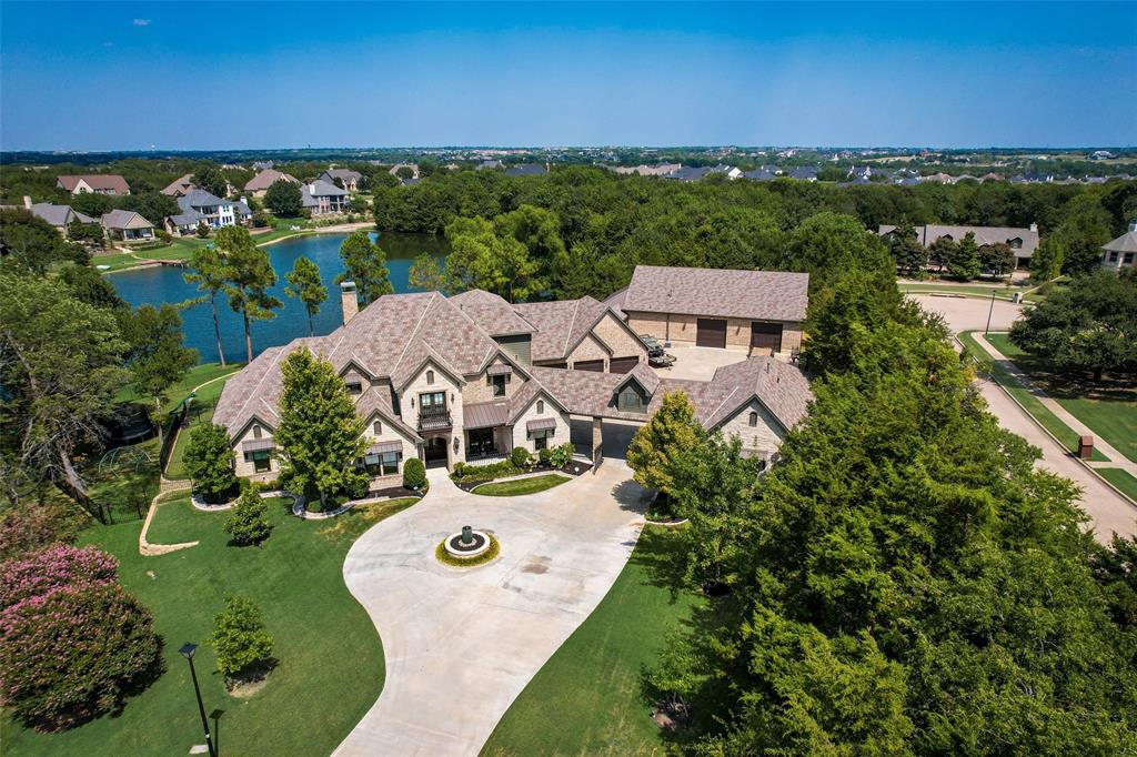 an aerial view of a house with a garden